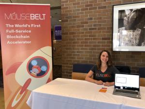 woman at conference booth