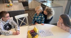 FOR IMMEDIATE RELEASE Making Lockdown Fun During Family Dinner Time Mom and kids talking