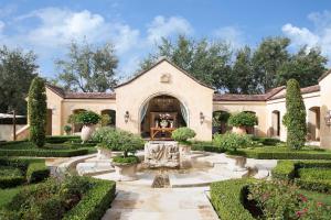 Classically landscaped courtyard and sculpture gardens, which feature a 14th century fountain.