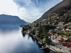 Concierge Auctions is pleased to announce that Villa Lucia in Laglio, Lake Como, Italy, offering four stories of lakeside luxury and stunning views of famous Lake Como, is pending sale following an active auction with 5 registered bidders, in cooperation with agents Beverley Rosen of Lake Como Properties, and the buyer’s agent Hamid Bathaee of Keller Williams