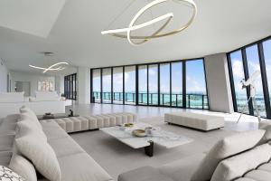 This residence floats high above the skyline and spans the entire 54th floor of one of Miami's most coveted addresses, an architectural wonder designed by legendary Zaha Hadid.