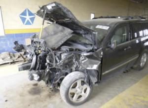 Wrecked SUV in Brain Injury Settlement