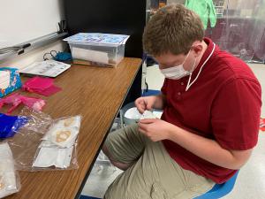 Houston-based, global fashion brand Klearly Kristen, Inc Autism Student learning E-Commerce Job Skills during new program in collobaration with Klearly Kristen, SafeShip Sugarland and Dulles High School in Fort Bend ISD, TX.