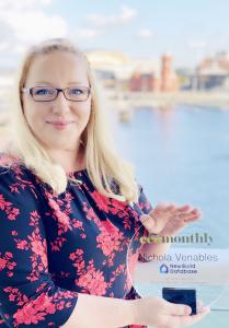 Nichola Venables CEO of NBDB Headshot, woman holding a glass trophy