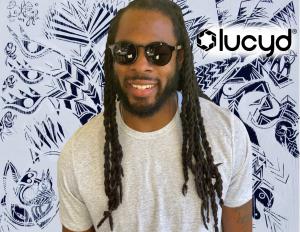 Richard Sherman, American football star, sporting Lucyd Lyte e-glasses.